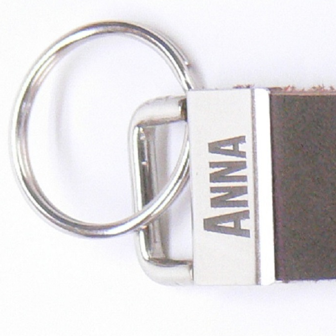 „Schlüsselband aus echtem Leder mit Blindprägung ‚Lehrerin / Lehrer mit Herz‘ und stabilem Metallverschluss – ideales Geschenk für Lehrkräfte.