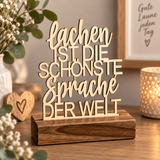 Deko Aufsteller - Lachen ist die schönste Sprache der Welt | personalisiert