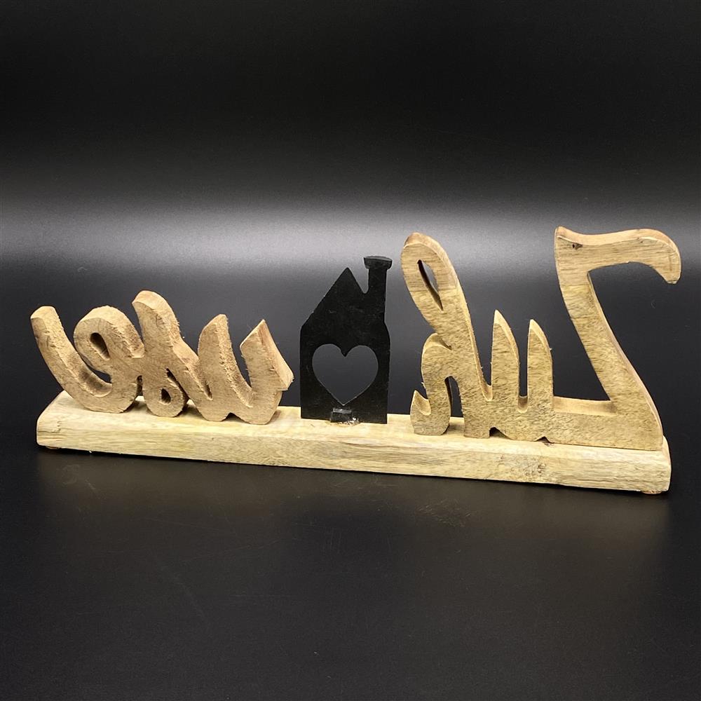Schriftzug Zuhause aus Mangoholz mit Häuschen aus schwarzem Metall, personalisierbar